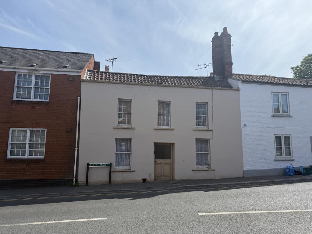 Lot: 70 - MID-TERRACE COTTAGE FOR REPAIR AND REFURBISHMENT - General view of the front of the property